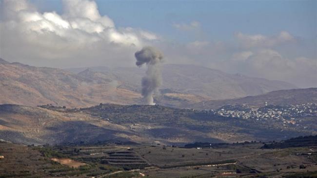 Smoke billows from the southern Syrian village of Hadar on November 3, 2017, as seen from the Israeli-occupied Golan Heights. (Photo by AFP)
