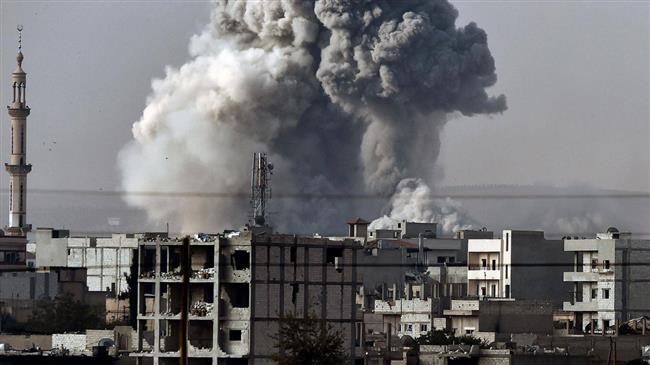 In this file picture, smoke rises from the Syrian town of Ain al-Arab, known as Kobane by the local Kurds, after a strike by the so-called US-led coalition as it is seen from the Turkish-Syrian border in the southeastern village of Mursitpinar, Sanliurfa province. (Photo by AFP)