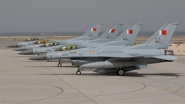 A line-up of four US-made F-16 fighter jetsat the holding ramp of Isa Air Base, Bahrain (file photo)
