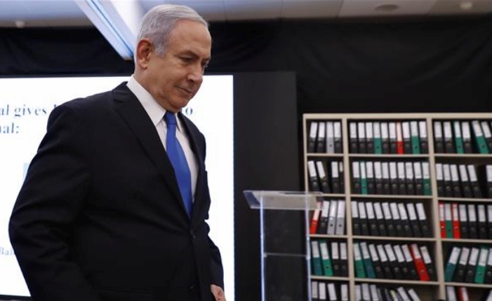 Israeli Prime Minister Benjamin Netanyahu leaves after delivering a speech on Iran