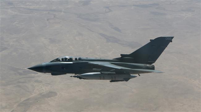 A British Royal Air Force Tornado fighter jet flies over central Iraq, September 21, 2016. (Photo by AFP)
