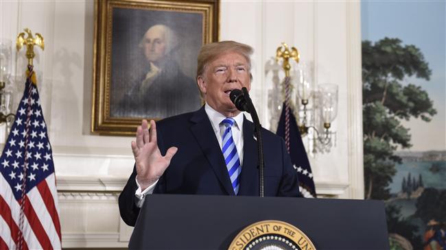 US President Donald Trump announces his decision on the Iran nuclear deal in the Diplomatic Reception Room at the White House in Washington, DC, on May 8, 2018. (Photo by AFP)
