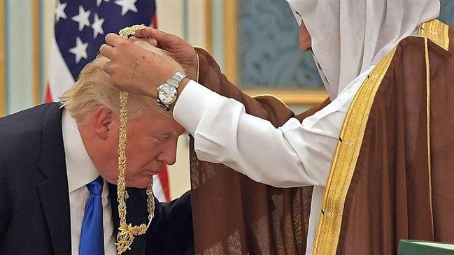 This file photo taken on May 20, 2017 shows US President Donald Trump (C) receiving the Order of Abdulaziz al-Saud medal from Saudi Arabia