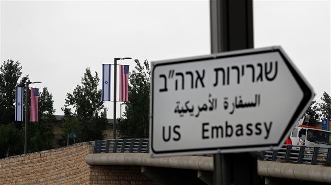A new road sign indicating the way to the new US embassy in Jerusalem al-Quds is seen on May 7, 2018. (Photo by AFP)
