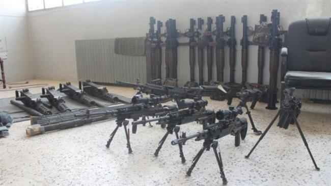 The file photo shows a weapons arsenal, in which many of the arms were reportedly issued through a US training programs.
