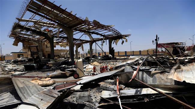 A picture taken on May 27, 2018 shows a view of a destroyed petrol station that was hit by a Saudi airstrike in the Yemeni capital city of Sana’a. (Photo by AFP)
