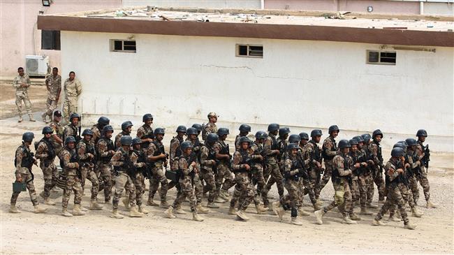 Members of the Iraqi Counter-Terrorism Service (CTS) take part in a training drill at the Special Forces Academy near Baghdad