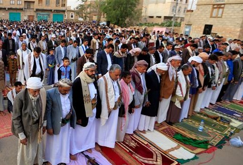 Yemeni Muslim worshippers perform Eid al-Fitr prayers in the capital Sana