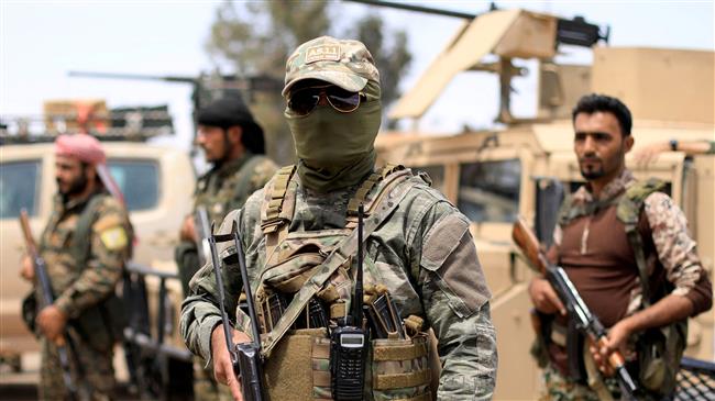 Militants of the so-called Syrian Democratic Forces (SDF) are seen in Dayr al-Zawr, Syria, May 1, 2018. (Photo by Reuters)