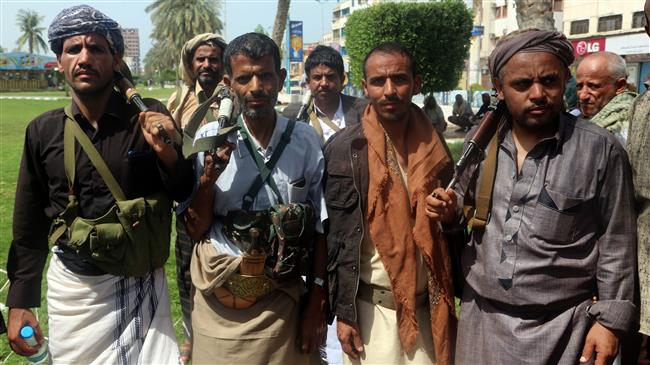 Yemen’s Houthi fighters are seen during a gathering to mobilize more fighters to the battlefront to fight pro-government forces, in the Red Sea port city of Hudaydah on June 18, 2018. (Photo by AFP)
