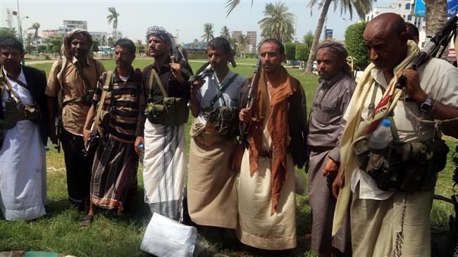 Houthi Ansarullah fighters are seen during a gathering to mobilize more forces to the battlefront to fight Saudi-led forces and militia, in the Red Sea port city of Hudaydah, Yemen, on June 18, 2018. (Photo by AFP)
