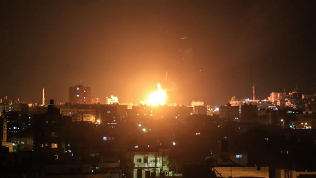 An explosion is seen in northern Gaza City after an airstrike by Israeli jets on June 20, 2018. (Photo by AFP)
