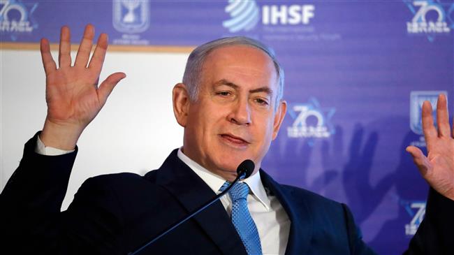 Israeli Prime Minister Benjamin Netanyahu gestures during his speech in Jerusalem al-Quds on June 14, 2018. (Photo by AFP)
