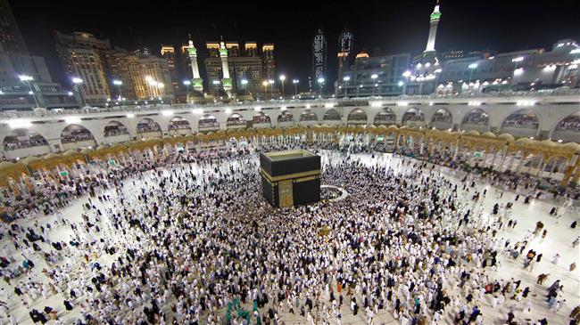 Muslim worshipers gather at the Grand Mosque in the Saudi holy city of Mecca on June 14, 2018. (Photo by AFP)
