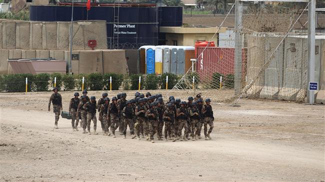 Members of the Iraqi Counter-Terrorism Service (CTS) take part in a training drill at the Special Forces Academy near Baghdad