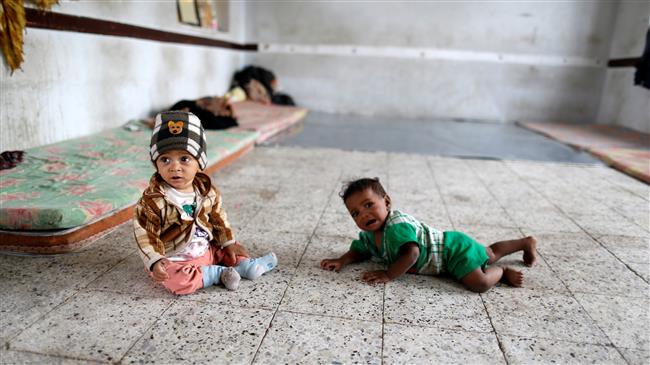 Yemeni children displaced from the Red Sea port city of Hudaydah are seen in a classroom at a school where the internally displaced persons (IDPs) live in Sana