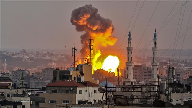 The picture taken on July 20, 2018 shows a fireball exploding in Gaza City during Israeli bombardment. (Photo by AFP)
