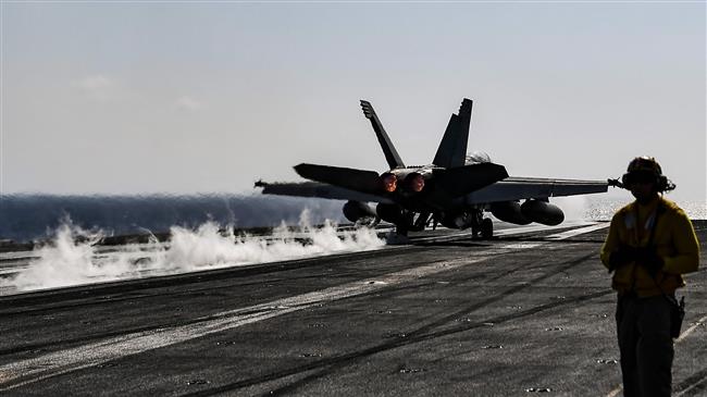 A F-18 Hornet fighter jet takes off from the deck of the US navy aircraft carrier USS Harry S. Truman in the eastern Mediterranean Sea on May 8, 2018. (Photo by AFP)