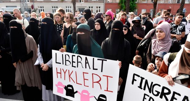 A demonstration on the first day of the implementation of the Danish face veil ban,
