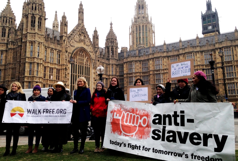 Protest outside the Houses of Parliament demanding to step up the fight against modern slavery in the UK
