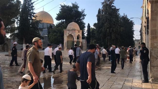 Israeli settlers and military forces are seen at the al-Aqsa Mosque compound in the occupied East Jerusalem al-Quds on July 22, 2018. (Photo by Safa news agency)
