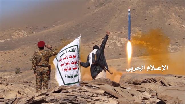 This file photo shows Houthi fighters in Yemen firing a missile at Saudi targets.
