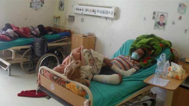 A wounded Yemeni civilian is receiving treatment at Police Typical Hospital in Sana