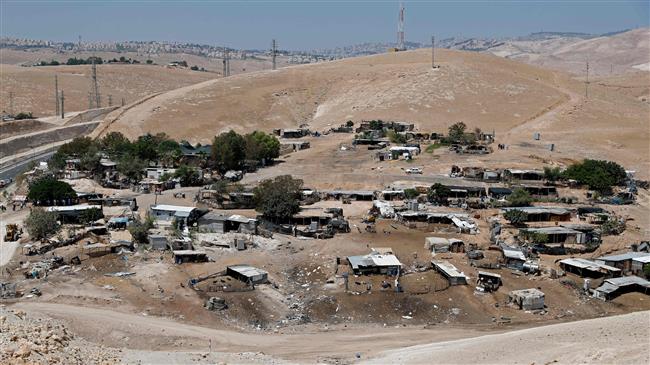 A general view of the Palestinian Bedouin village of Khan al-Ahmar, east of Jerusalem al-Quds, in the Israeli-occupied West Bank, on July 5, 2018 (photo by AFP)
