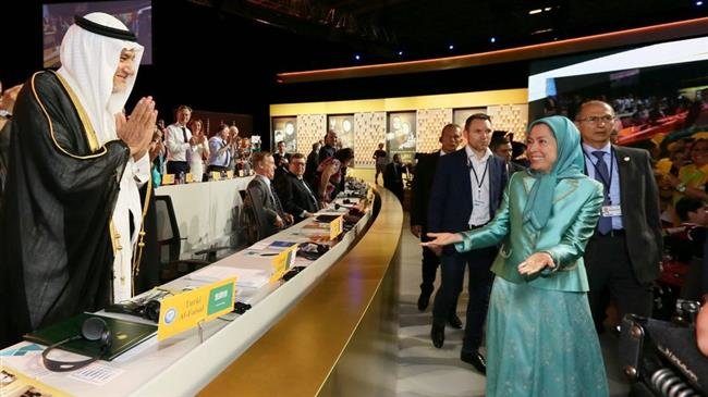 Prince Turki bin Faisal Al Saud (L) greets Maryam Rajavi, chief of the MKO terror group during a gathering in Paris in July 2016.
