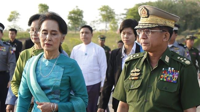 Myanmar’s military chief Min Aung Hlaing is seen alongside the country’s de facto leader Aung San Suu Kyi in this file photo.
