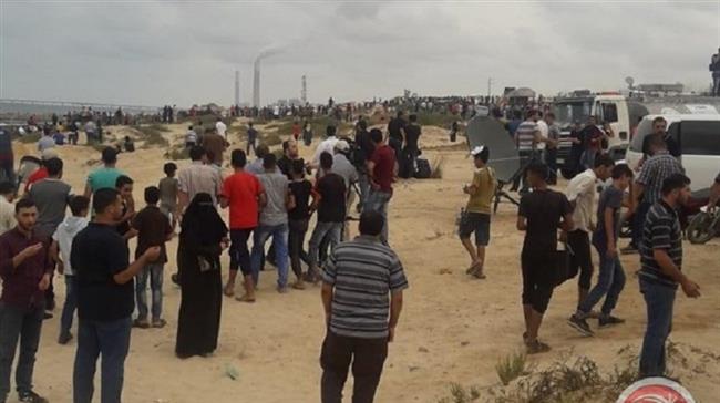 Palestinian protesters hold an anti-Israeli rally in northern Gaza on October 1, 2018. (Photo by Palestinian Ma