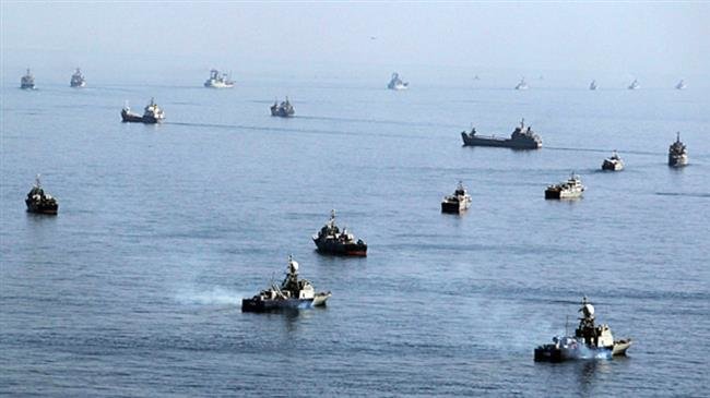 Iranian ships participate in a naval parade on the last day of the Velayat-90 war game on the Sea of Oman near the Strait of Hormuz on January 3, 2012. (Reuters file photo)
