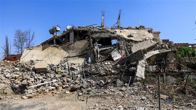 A picture taken on September 5, 2018 shows the remains and rubble of a building that was destroyed in a Saudi airstrike in the capital Sana’a. (Photo by AFP)

