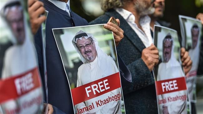Protestors hold up pictures of missing journalist Jamal Khashoggi during a demonstration in front of the Saudi Arabian consulate in Istanbul, October 5, 2018. (Photo by AFP)
