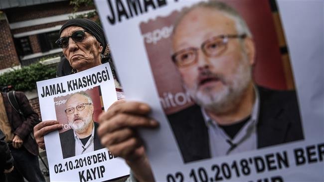 Protesters holds a portrait of missing journalist and Riyadh critic Jamal Khashoggi reading "Jamal Khashoggi is missing since October 2" during a demonstration in front of the Saudi Arabian consulate on October 9, 2018 in Istanbul. (Photo by AFP)
