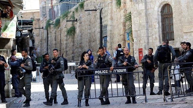 Israeli police officers secure the area near the scene of a shooting in the occupied Old City of Jerusalem al-Quds on Jul 14, 2017. (Photo by Reuters)
