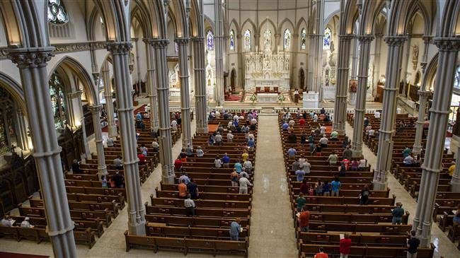 Parishioners worship during a mass at St Paul Cathedral on August 15, 2018 in Pittsburgh, Pennsylvania. (Getty Images)

