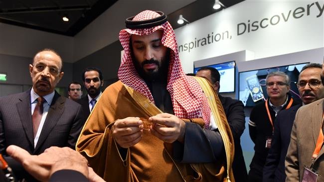 Saudi Crown Prince Mohammed bin Salman observes a showing of Saudi Arabian technology, including an exhibit by King Abdullah University of Science and Technology, during a visit to Massachusetts Institute of Technology, March 24, 2018. (Photo by AP)
