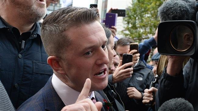 Stephen Yaxley-Lennon, AKA Tommy Robinson, founder and former leader of the anti-Islam English Defence League (EDL), reacts outside the Old Bailey, London