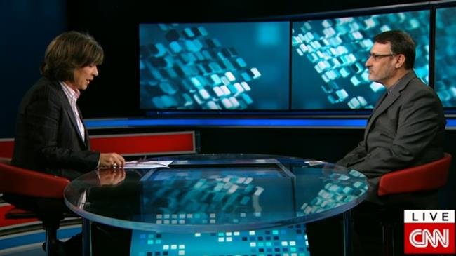 Frame grab from an interview with Iran’s UK Ambassador Hamid Baeidinejad (R) by CNN’s Christian Amanpour
