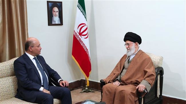 Leader of the Islamic Revolution Ayatollah Seyyed Ali Khamenei (R) and Iraqi President Barham Salih meet in Tehran on November 17, 2018. (Photo by khamenei.ir)
