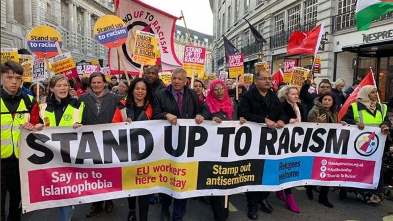Hundreds of demonstrators gather outside the BBC headquarters in London, Britain, to protest racism and fascism, on November 17, 2018.
