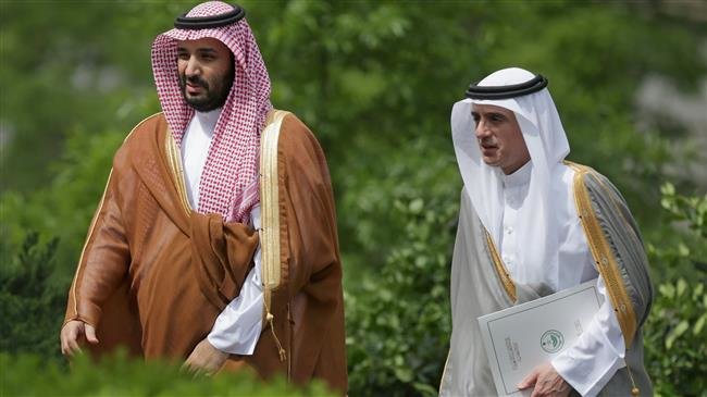 In this May 13, 2015 photo, then Saudi Deputy Crown Prince Mohammed bin Salman (L) and then Saudi Ambassador to the US Adel al-Jubeir arrive at the White House in Washington, DC. (Photo by Getty Images)

