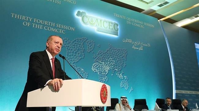 The photo released the Anadolu news agency Turkish President Recep Tayyip Erdogan speaks at the 34th meeting of the Standing Committee for Economic and Commercial Cooperation of the Organization of Islamic Cooperation (OIC) in Istanbul on November 28, 2018.
