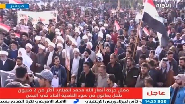 People participate in a rally in the al-Jadriya neighborhood of Baghdad, Iraq, on November 30, 2018 in condemnation of the Saudi-led military aggression on Yemen. (Photo by Iraq’s Arabic-language al-Itejah television network)
