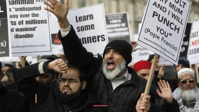 File photo shows Muslims during a demonstration in the British capital of London.
