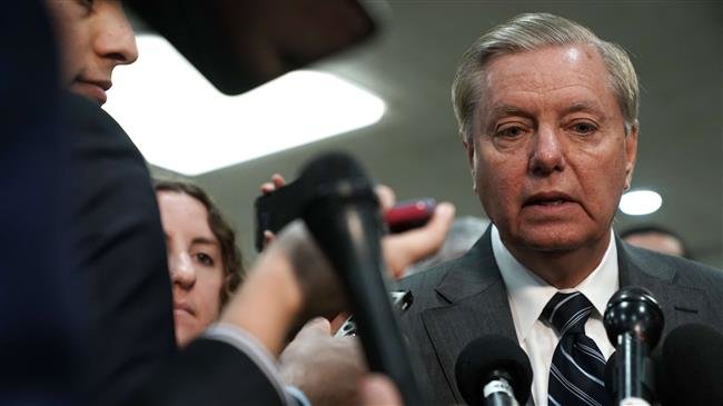 US Sen. Lindsey Graham (R-SC) speaks to members of the media after a closed door briefing by Central Intelligence Agency Director Gina Haspel to members of Senate Foreign Relations Committee and Senate Armed Services Committee on December 4, 2018 on Capitol Hill in Washington, DC. (AFP photo)
