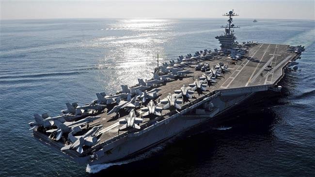 This undated file photo shows USS John C. Stennis aircraft carrier during a mission.
