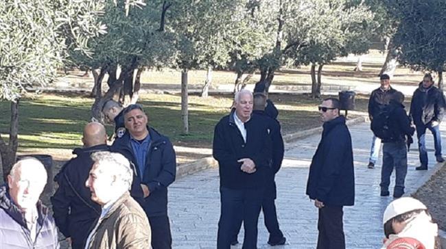 Uri Ariel, the Israeli minister of agriculture and rural development, center, and companions gather around al-Aqsa compound in the occupied Old City of East Jerusalem al-Quds on December 9, 2018. (Photo by Ma