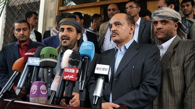 Houthi spokesman Mohammed Abdulsalam (2nd L, front) speaks during a press conference at the Sana